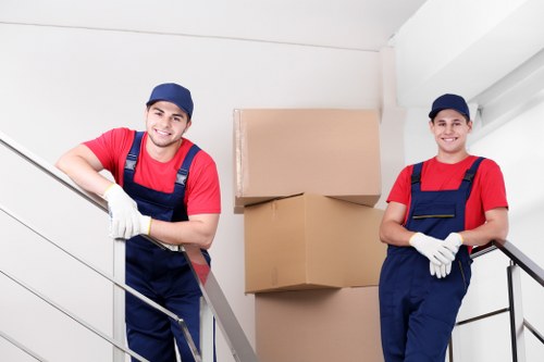 Person organizing belongings in an Edgware storage unit