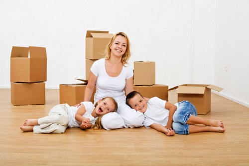 Packed boxes and furniture ready for a small removal service in Edgware